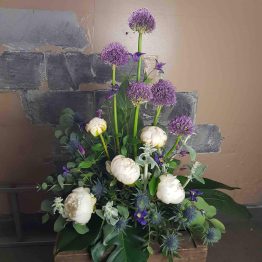 begravningsdekoration lila